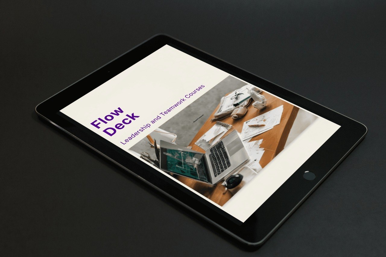 Tablet displaying a presentation slide with 'Flow Deck' branding on a dark background